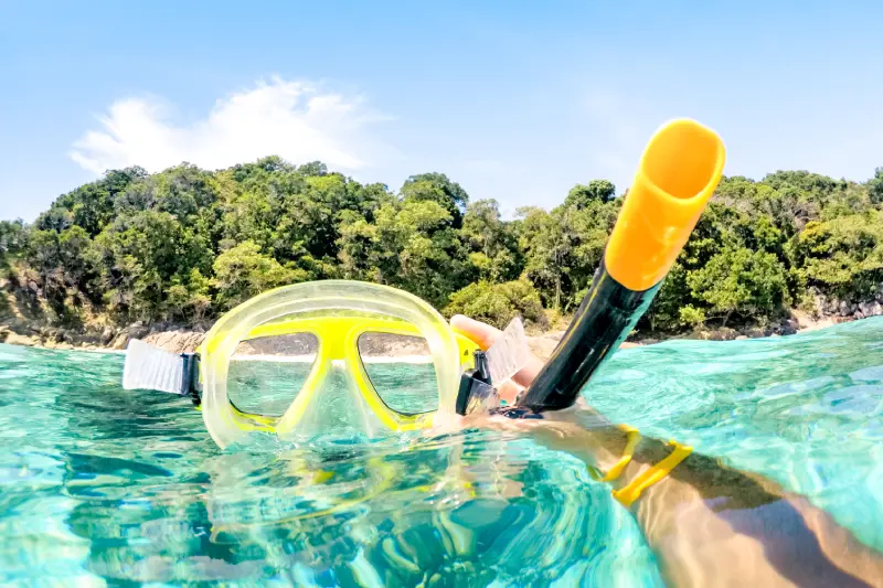 adventurous guy taking photo of snorkeling mask un 2024 07 03 02 44 12 utc