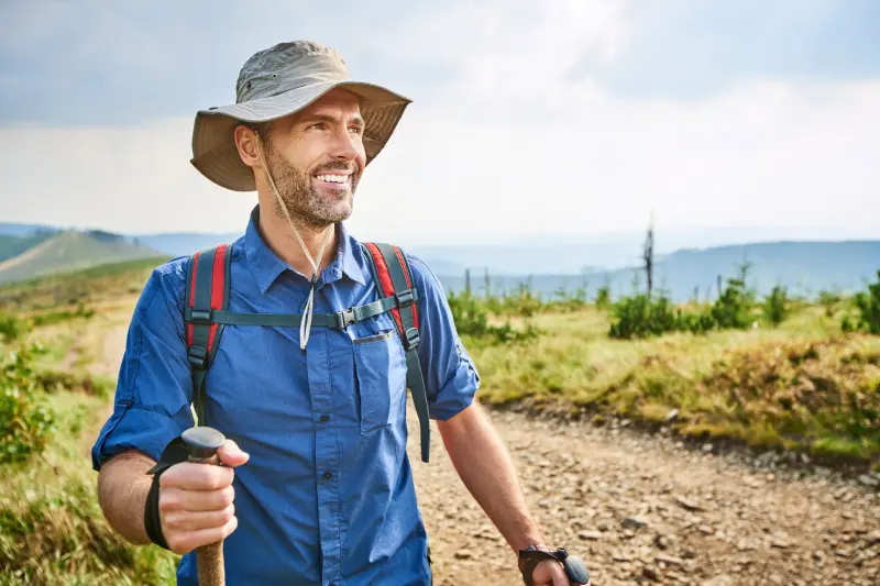 portrait of smiling man hiking in the mountains 2024 09 22 08 31 49 utc